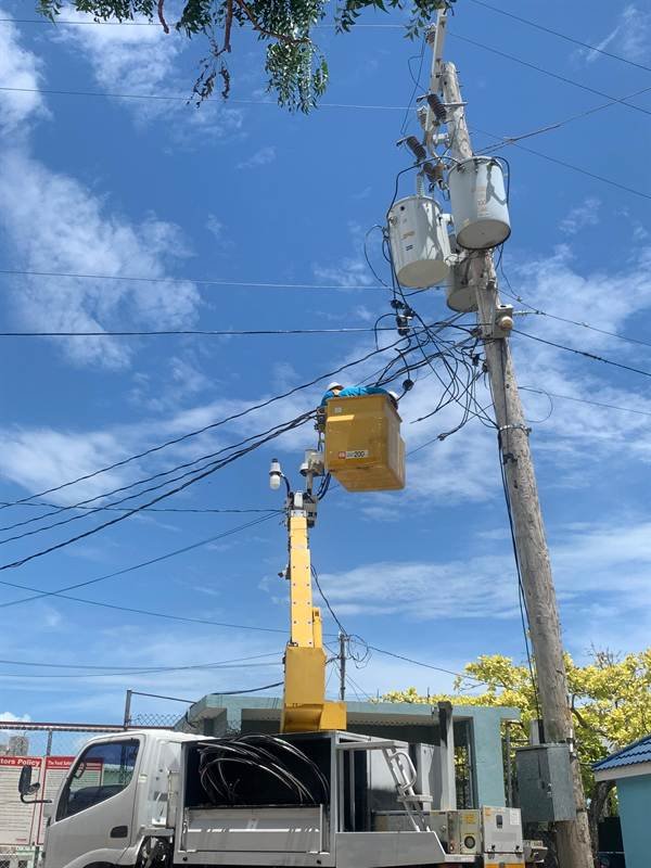 Pole hardware installation at Oil Factory, Clarendon