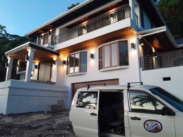 Smart villa front elevation with exterior lighting in Jacks Hill, Kingston