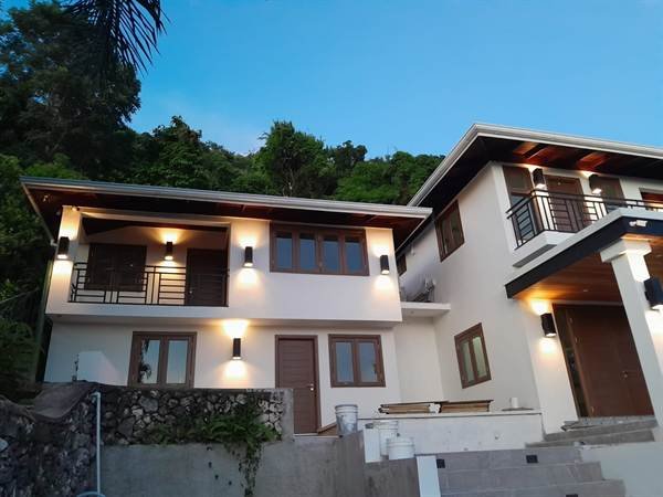 Smart villa balcony with exterior lighting in Jacks Hill, Kingston