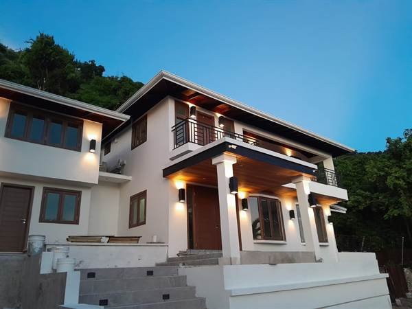 Smart villa entrance with exterior lighting in Jacks Hill, Kingston